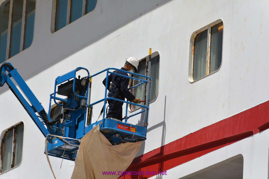 010: Carnival Imagination, Ensenada, Repairing a window it would seem.