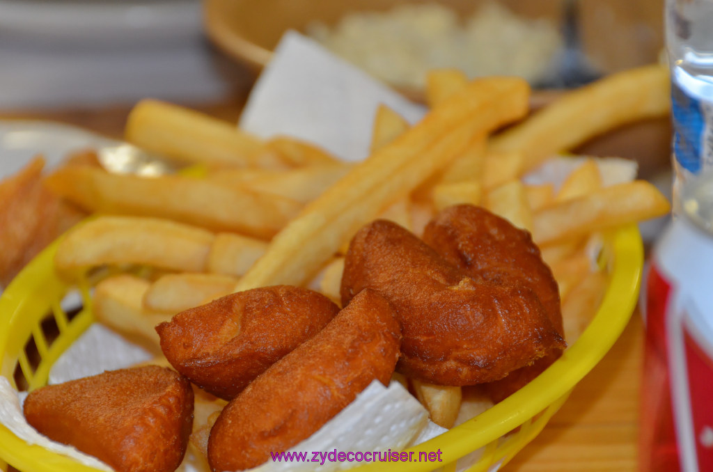 006: Shockley's Fish and Fixin's, Fries and Donut like things with the Catfish Dinner. There's butter and honey for those.